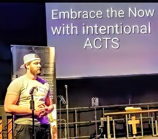 Joshua Rash speaking at community event